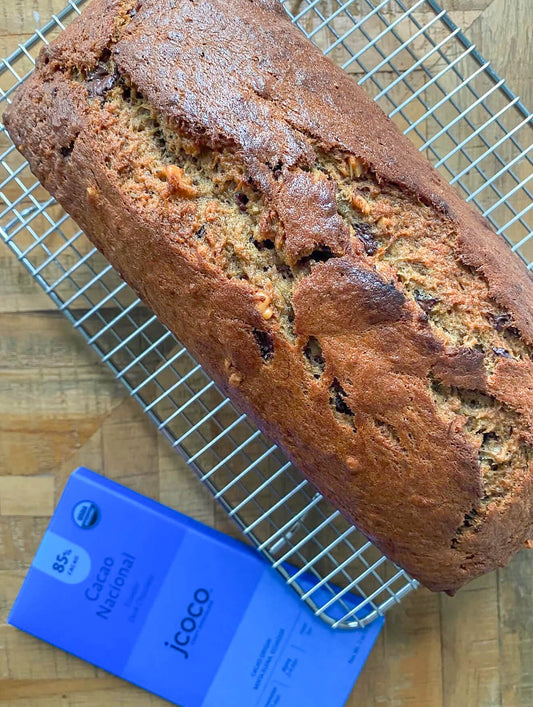 loaf of dark chocolate banana bread featuring jcoco's 85% dark chocolate from Ecuador. get the recpie!
